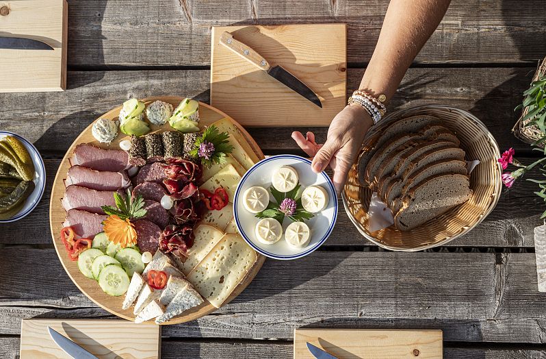 Brettljause auf Bichlalm